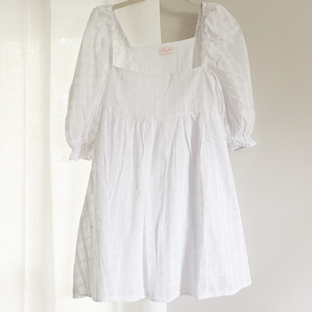 Super cute white baby doll dress from pink lily size XS